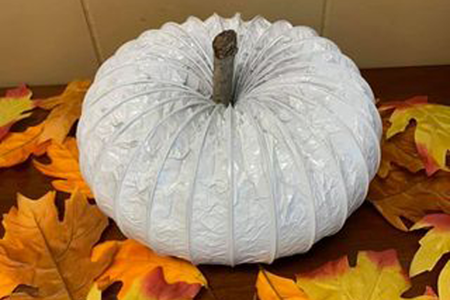 A pumpkin made from a drier vent.