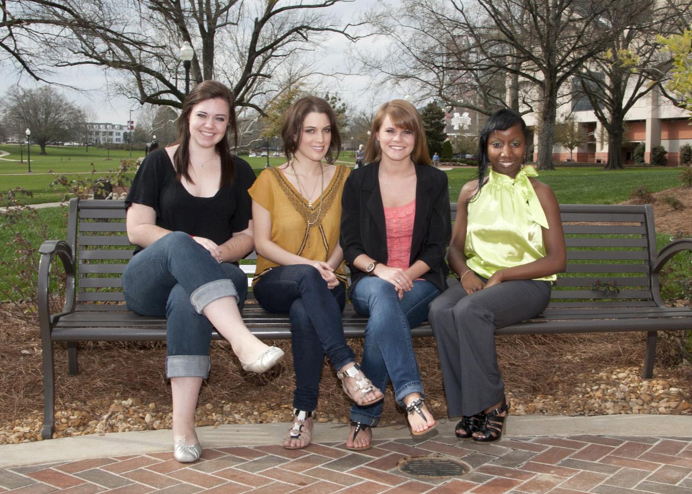 Mississippi State University students in the College of Agriculture and Life Sciences' Apparel, Textiles, and Merchandising program swept the awards in the student merchandising exhibit competition at the recent Mississippi Association for Family and Consumer Sciences annual state conference. From left: Storey Wilson, third place; Hana Ali and Holly Farlow, first place; Lashaunda Bobbett, second place. (Photo by Kat Lawrence)