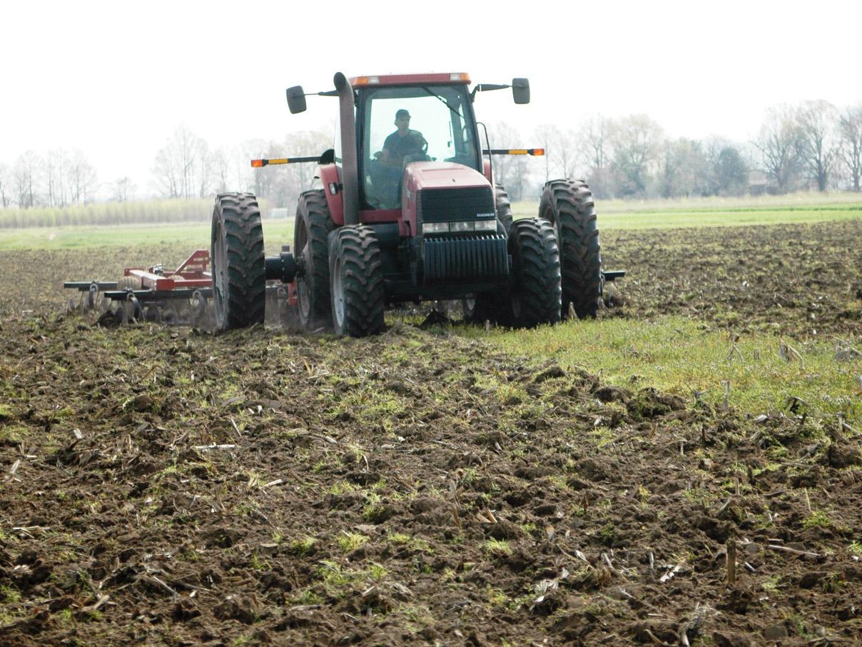 Agricultural Technician Rodney Coleman disks a soybean field on March 21, 2011, for spring planting at Mississippi State University's Delta Research and Extension Center. Located in Stoneville, the MSU experiment station covers almost 4,300 acres. (Photo by DREC Communications/Rebekah Ray).