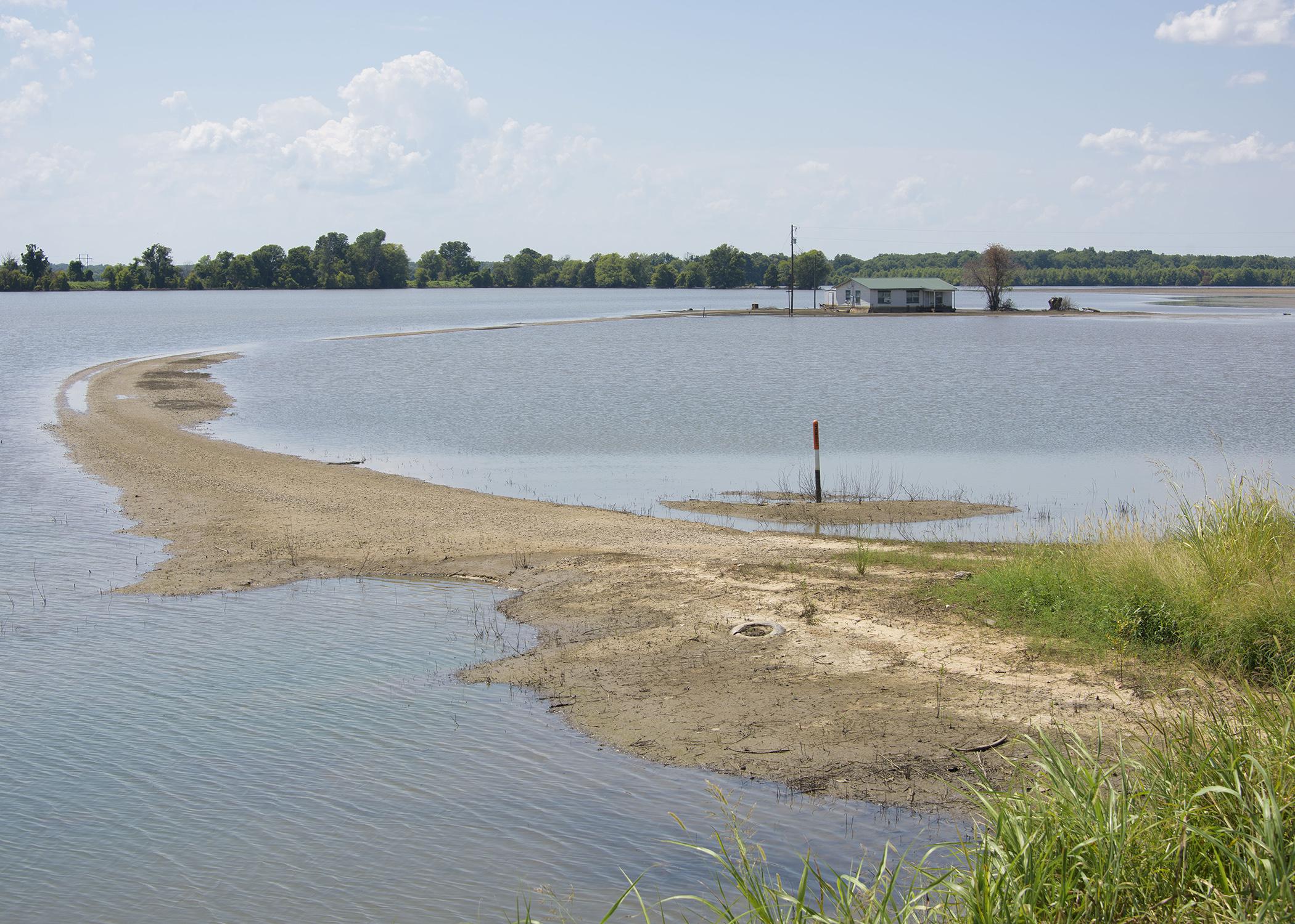 Flood waters surround a home in the south Delta.