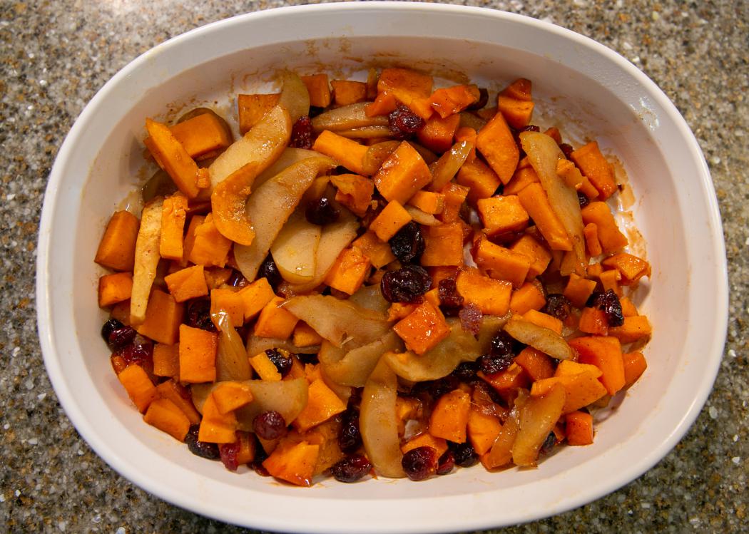 A closeup of sweet potato and apple casserole