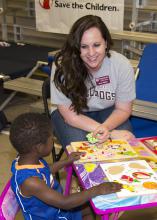 This is an image of Anna Hughes, a field technical assistant with the Early Years Network helped with post-tornado child care at a Red Cross Shelter in Louisville, MS in May, 2014.