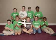 Mississippi 4-H’ers in the Oktibbeha County Clover Dawgs robotics engineering club celebrate 4-H National Youth Science Day. The Oct. 5 event features an engineering challenge for young people. (Photo by MSU Extension Service/Kat Lawrence)