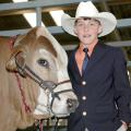 Lane Valentine, 12, of Bay Springs, sold his reserve champion Brahman steer Thursday at the Dixie National Sale of Junior Champions in Jackson. (Photo by Bonnie Coblentz)