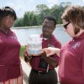 Amy Schmidt, right, Extension water quality specialist, shows 4-H youth agents Navlean Pittman of Lawrence County and Patrick Morgan of Copiah County a groundwater model depicting a water table. The three attended in-service training for state 4-H agents held recently in Tupelo. (Photo by Jim Lytle)