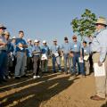 Johnie Jenkins, a U.S. Department of Agriculture researcher, discussed ongoing Mississippi State University and USDA research with cotton researchers and breeders touring facilities in the mid-South. (Photo by Scott Corey)