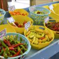 Cooper Farms, located in Smith County, offered a variety of colorful peppers at the Mississippi Farmers Market on High Street in Jackson, Mississippi, Aug. 5, 2014. Consumers increasingly turn to truck crops farmers for locally grown fruits and vegetables. (Photo by MSU Ag Communications/Susan Collins-Smith)