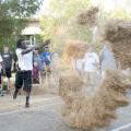 Mississippi State University defensive lineman Denico Autry of Albemarle, N.C., has explosive results with his throw during a friendly hay toss competition against fellow football players on the MSU campus Sunday afternoon, Aug. 19, 2012. The second annual Beefin’ up the Bulldogs included a steak supper and activities promoting MSU’s land-grant heritage. Sponsors included First South Farm Credit, Mississippi Cattlemen’s Association, Mississippi Beef Council and MSU’s Animal and Dairy Science Department. (Ph