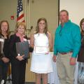 Mississippi State University junior and agribusiness major Joanna King, center, of Yazoo County, receives the Mississippi Women in Agriculture-Dianne Evans Memorial Scholarship during the 2013 Mississippi Women in Agriculture Conference Feb. 28 in Raymond. Pictured with King, from left, is Mississippi Women in Agriculture President Sherilyn Jones; Mississippi Commissioner of Agriculture and Commerce Cindy Hyde-Smith; and Dianne Evans' children, Robert Evans and Deena Evans Lowery. (Photo by MSU Ag Communica