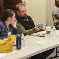 Althea and Joel Bontrager of Columbus examine a communication ball at the beginning of a three-hour workshop for foster/adoptive parents in the Oktibbeha County Extension Office on March 19, 2016. (Photo by MSU Extension Service/Kevin Hudson)