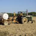 Eddie Stevens, farm supervisor at Mississippi State University’s R. R. Foil Plant Science Research Center in Starkville, was applying a liquid fertilizer to a corn field on April 5, 2016. Correct application of nutrients is a key part of environmental stewardship and efficient farm management. (Photo by MSU Extension Service/Kevin Hudson)