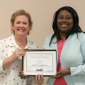 Melissa Tenhet, director of the Mississippi State University School of Human Sciences’ Child Development and Family Studies Center, left, and Andrelyn Smith, center manager, celebrate the center’s recent notice of accreditation. (Photo by MSU Extension Service/David Doleac)